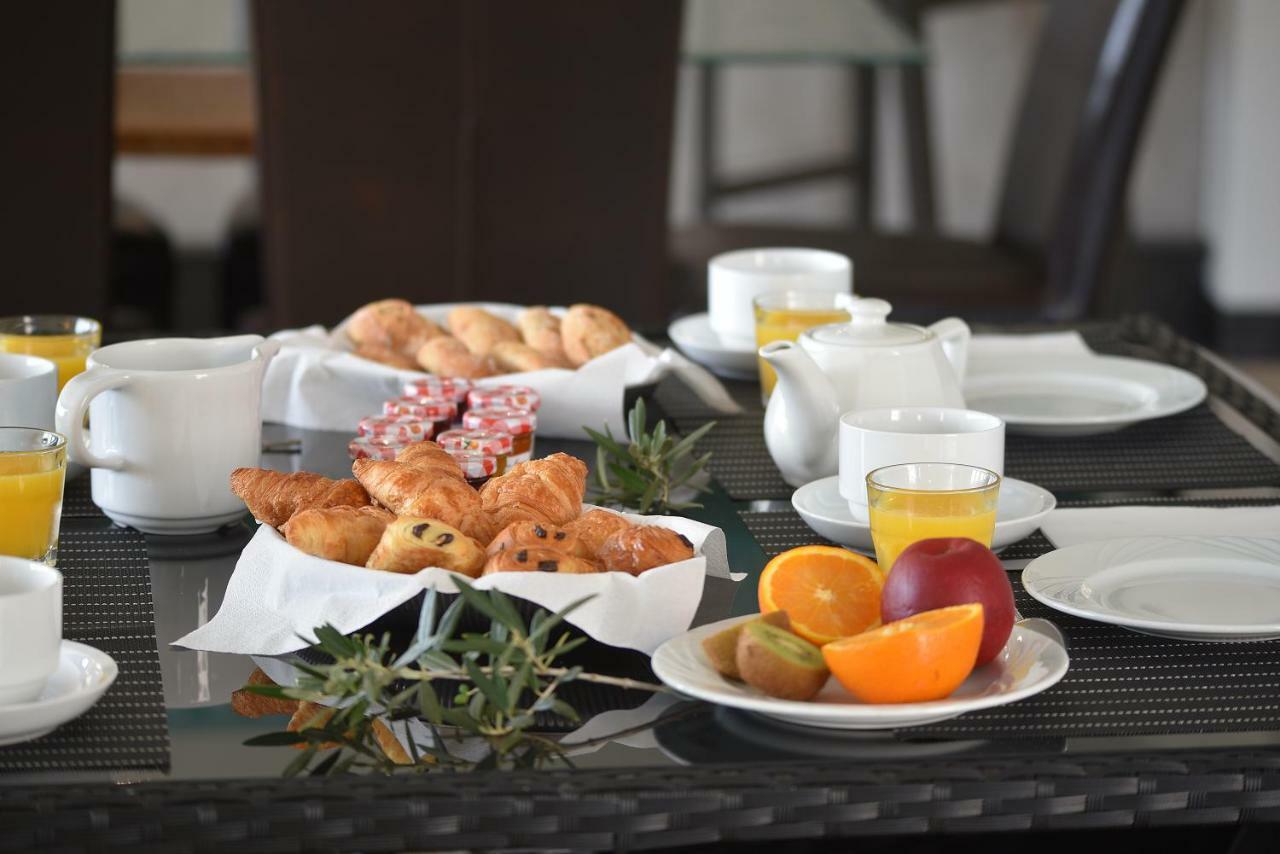 Hotel Le Tilbury ปอร์โต-เวคคีโอ ภายนอก รูปภาพ